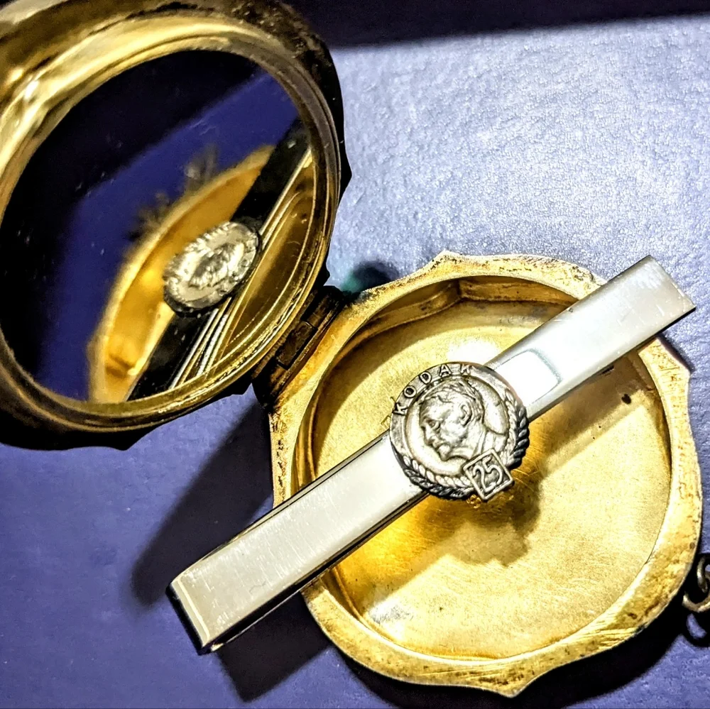 Vtg 1954 sterling silver Kodak 25 years coin tie clip antique